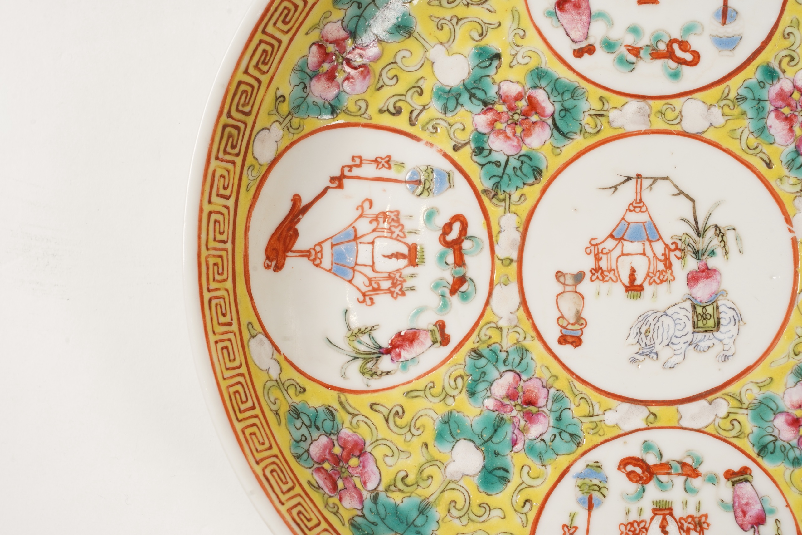 A pair of Chinese yellow ground medallion saucer dishes, Guangxu six character marks, early 20th century